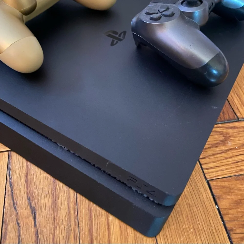 PlayStation 4 Slim with Two Controllers and Power Cord